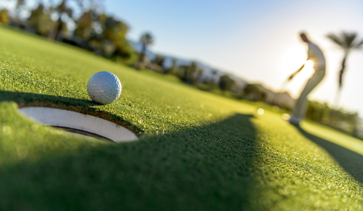 Golf Ball near the Hole