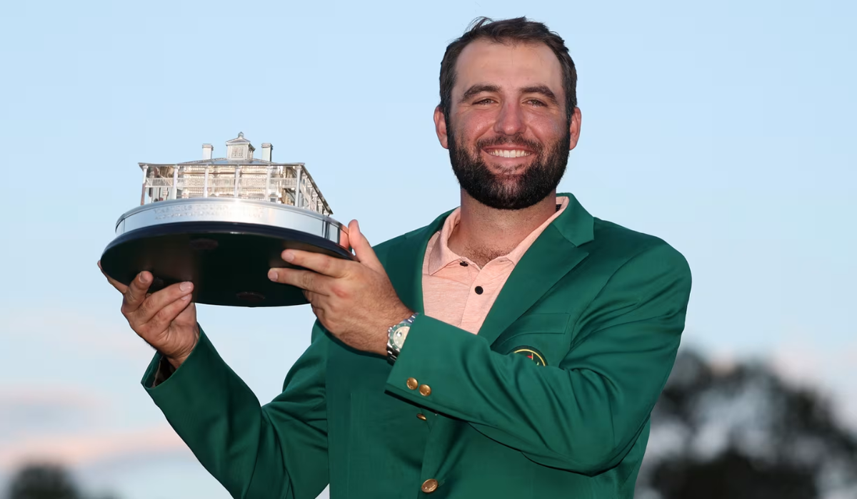 Scheffler holding the Masters trophy