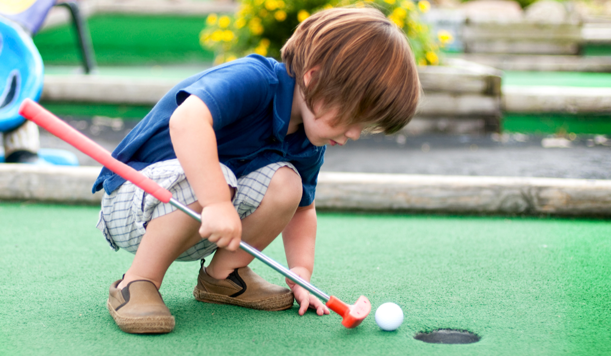 Child with Toy Golf Club