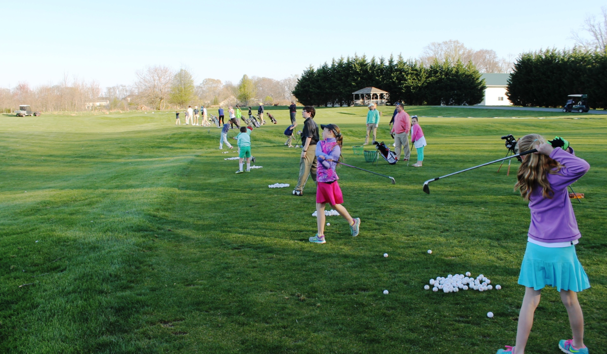 Kids Practicing Playing Golf