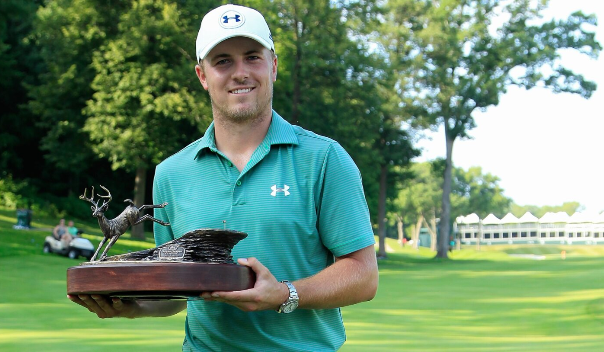 Spieth holding the trophy at the 2013 John Deere Classic