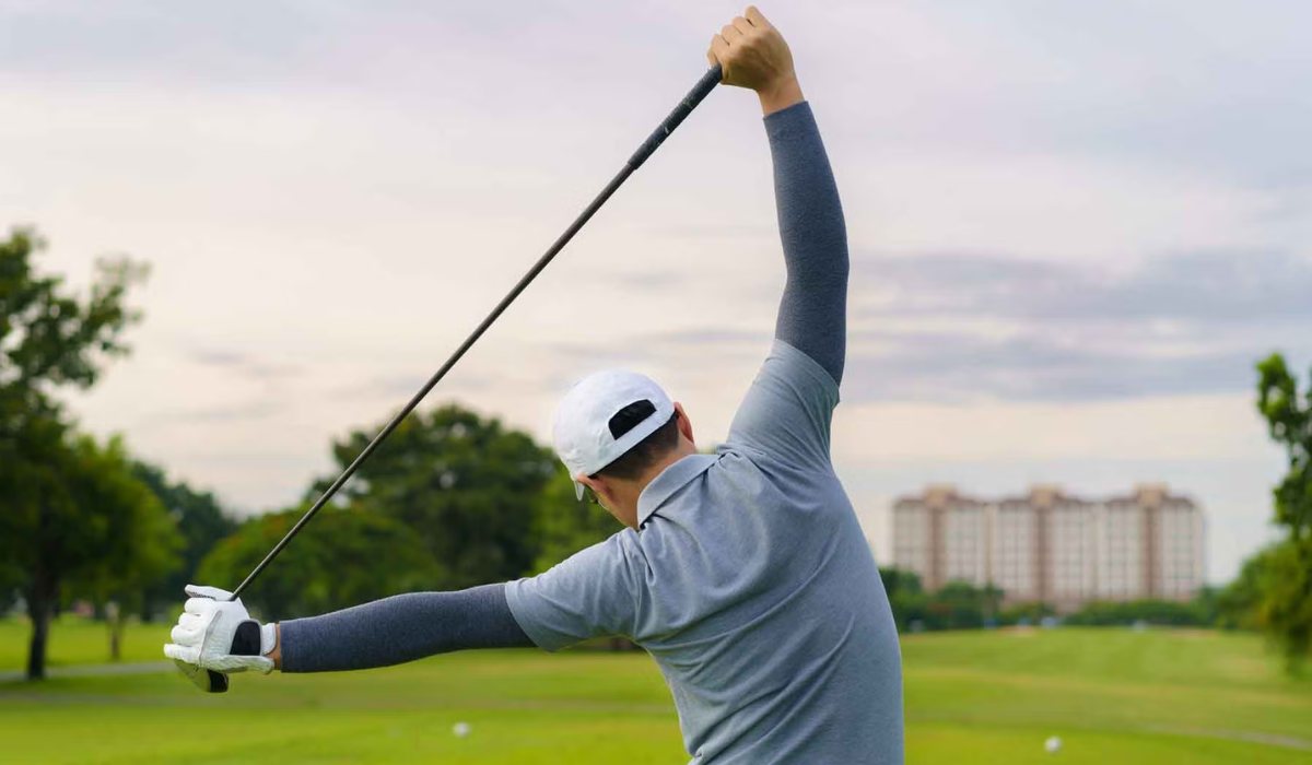 Golfer Stretching on the Golf Course