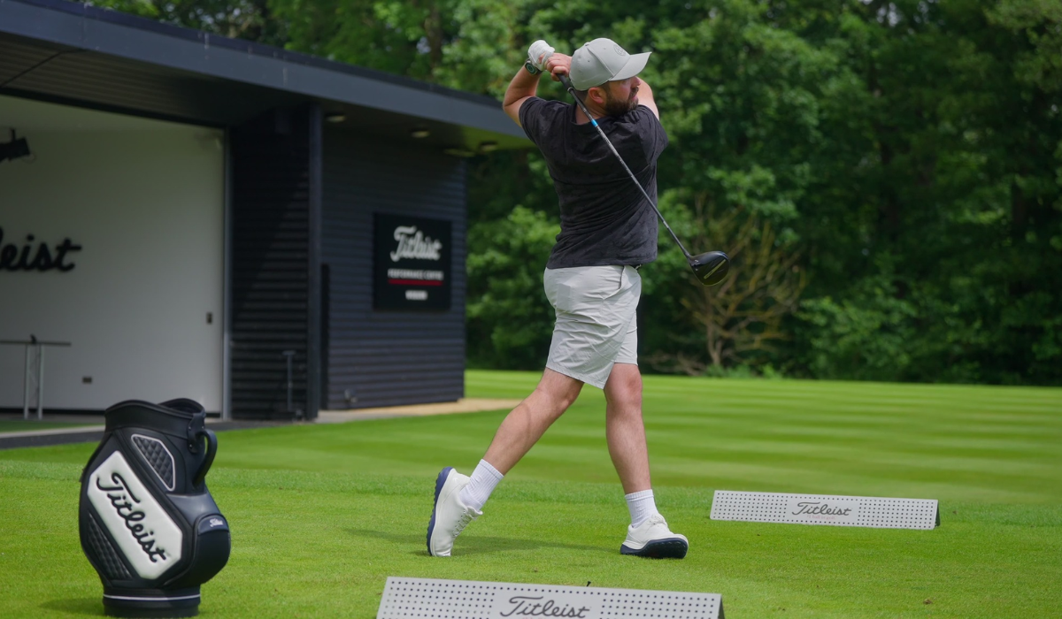 Golfer with Titleist Driver