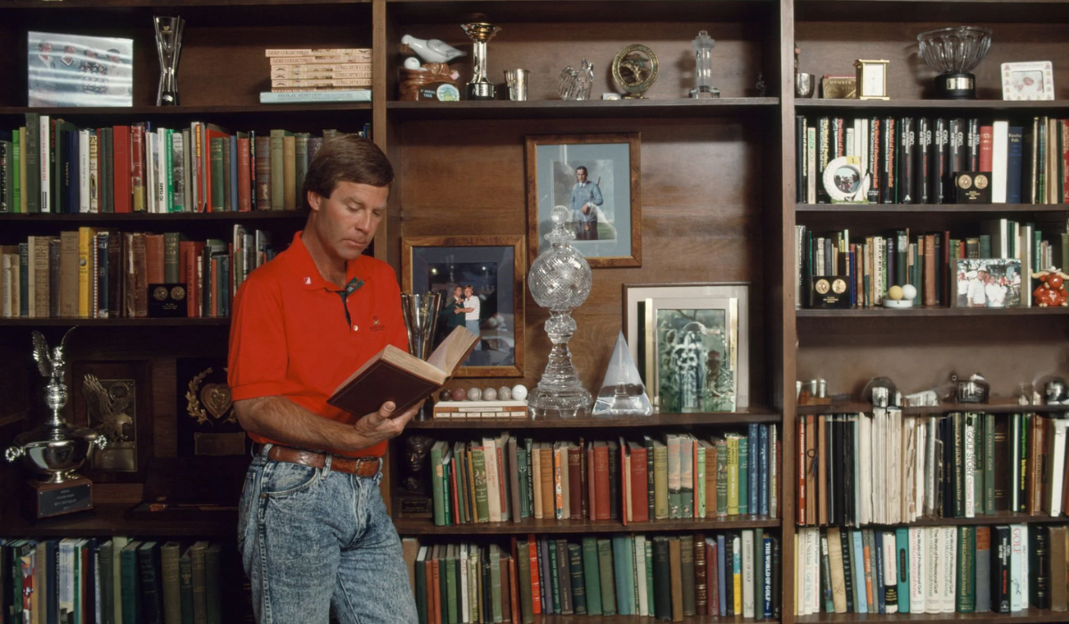 Golfer Reading Golf Books
