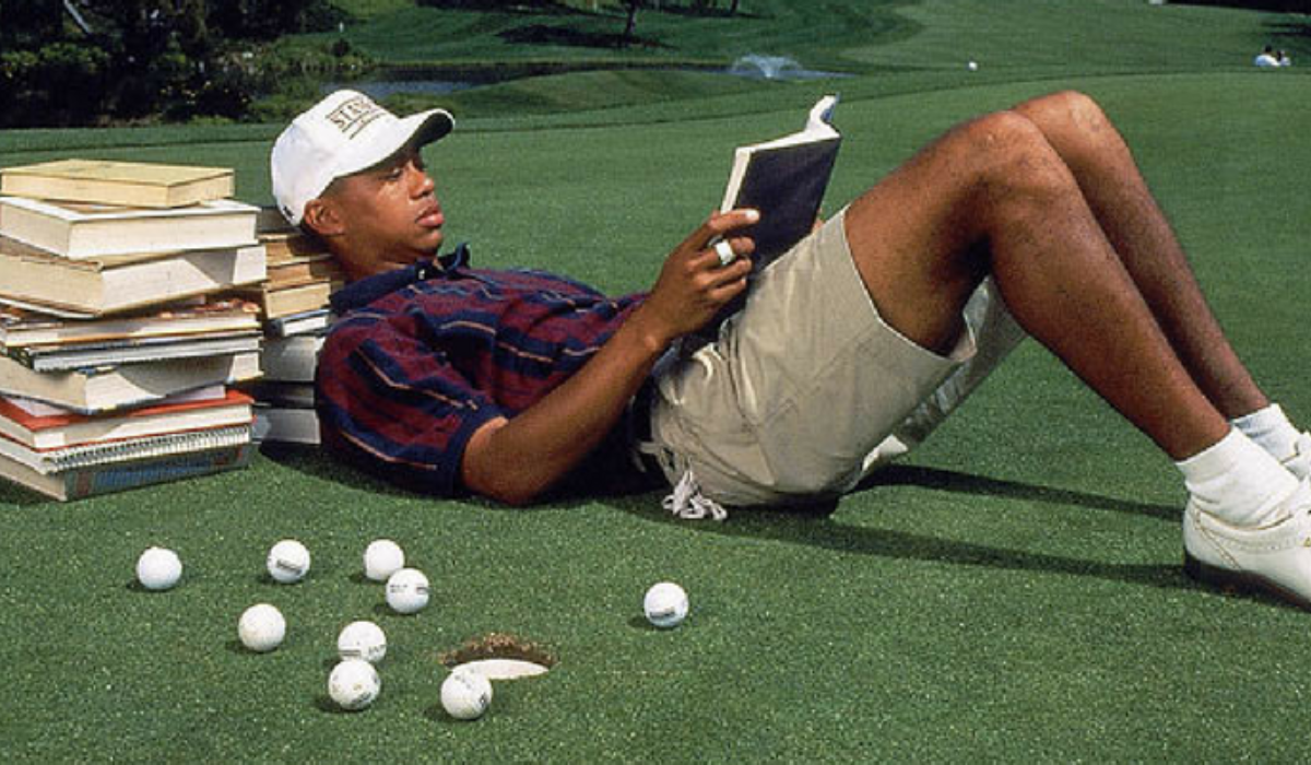Tiger Woods with Golf Books
