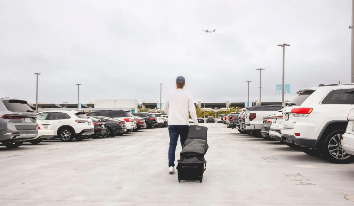 Golfer with Clubs at Airport