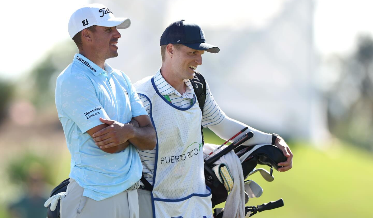 Golfer and Caddie Smiling
