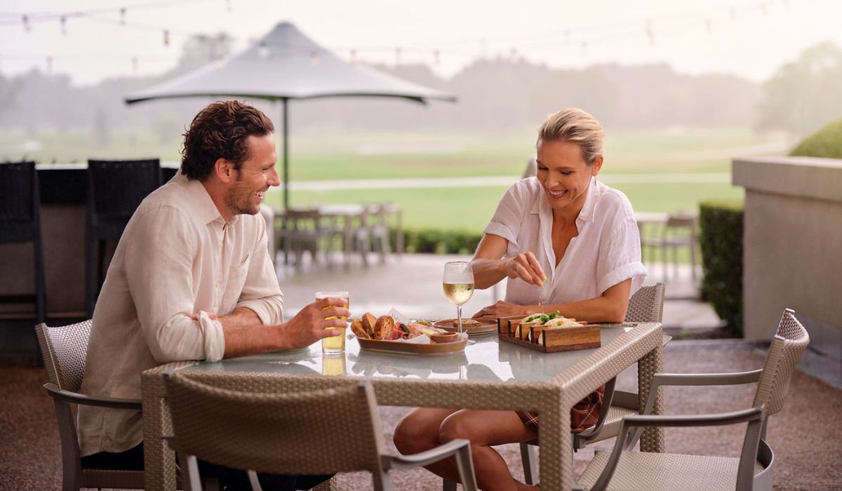 Couple Dining on Golf Course