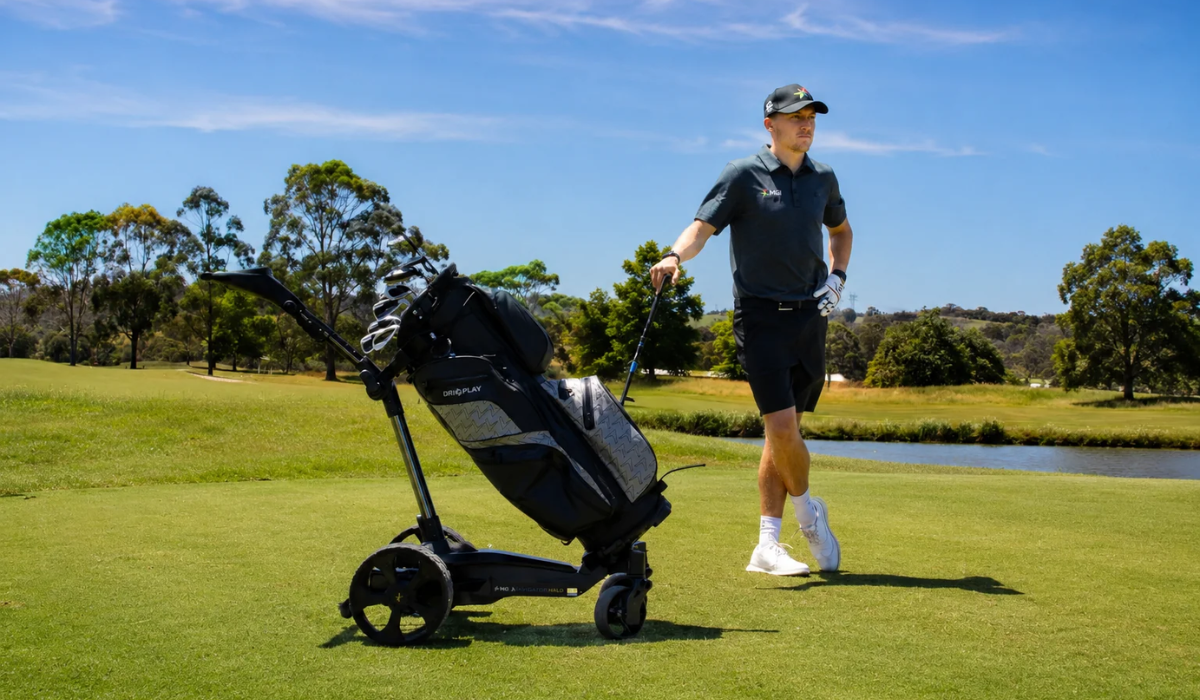Golfer with Electric Trolley